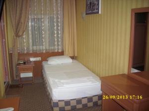 Postel nebo postele na pokoji v ubytování Saray Hotel