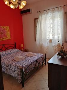 Postel nebo postele na pokoji v ubytování Mediterraneo Appartaments
