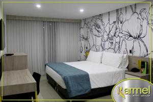 Letto o letti in una camera di Hotel Karmel