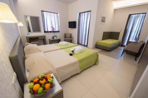 Postel nebo postele na pokoji v ubytování Astron Hotel