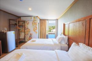 Postel nebo postele na pokoji v ubytování S48 Hotel