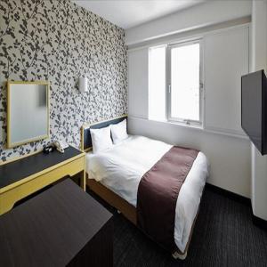 Cama o camas de una habitación en Ai Hotel Ageo