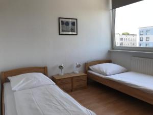 Cama o camas de una habitación en City Inn