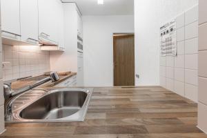 Küche/Küchenzeile in der Unterkunft Residenz Alpina 115