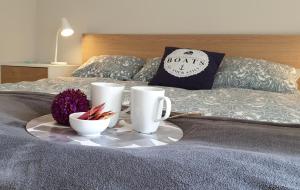 Posteľ alebo postele v izbe v ubytovaní Lake View Apartment