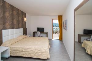 Posteľ alebo postele v izbe v ubytovaní Exclusive Suites Riva
