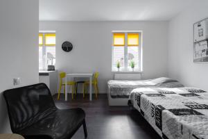 Łóżko lub łóżka w pokoju w obiekcie Stay99