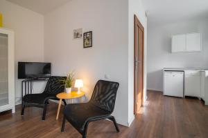 Kuchnia lub aneks kuchenny w obiekcie Stay99