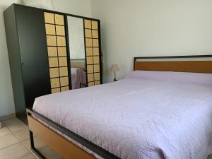 Postel nebo postele na pokoji v ubytování Appartement Gerezitenia