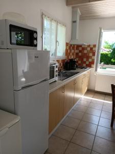 Kuchyň nebo kuchyňský kout v ubytování Appartement Gerezitenia