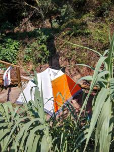 Zahrada ubytování Les Bambous, camping naturiste