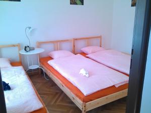 Postel nebo postele na pokoji v ubytování UBYTOVÁNÍ SVOJANOV