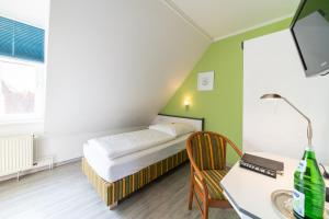 TV a/nebo společenská místnost v ubytování Hotel Stadtkrug