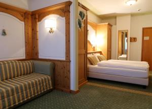 Postel nebo postele na pokoji v ubytování Hotel Belvedere Srl