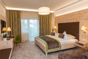 Posteľ alebo postele v izbe v ubytovaní Thermenhotel PuchasPLUS Stegersbach