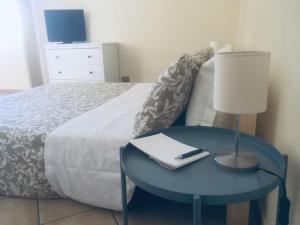 Giường trong phòng chung tại Casa Curró