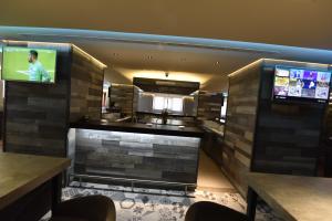 TV a/nebo společenská místnost v ubytování BUSINESS HOTEL SFAX