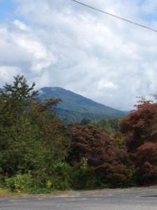 a view of a mountain from the side of a road at Ridge Top Motel - Bryson City in Bryson City