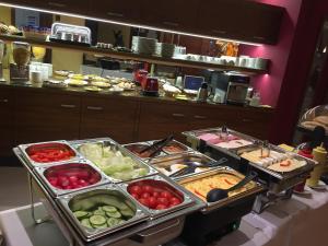 a buffet line with many different types of food at Hotel Air in Holíč