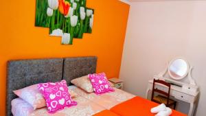 Posteľ alebo postele v izbe v ubytovaní Apartments Desa Petric