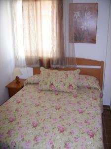 Postel nebo postele na pokoji v ubytování Los Olivos