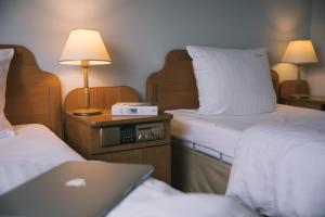 
Łóżko lub łóżka w pokoju w obiekcie Motel S3
