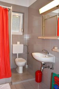 Koupelna v ubytování Apartments Josip