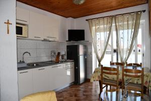 Kuchyň nebo kuchyňský kout v ubytování Apartments Josip