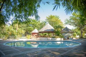 Swimming pool sa o malapit sa Tropical Escape Villa