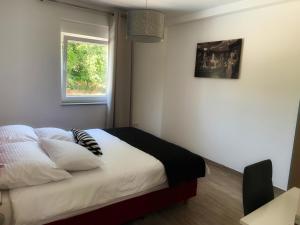 Łóżko lub łóżka w pokoju w obiekcie Villa Lord