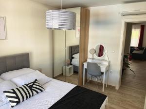 Łóżko lub łóżka w pokoju w obiekcie Villa Lord