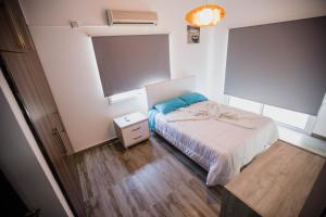 Кровать или кровати в номере Twins Apartments +39 фотографий