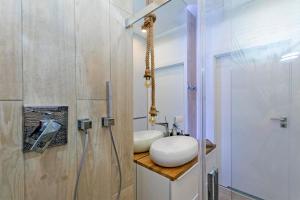 Kúpeľňa v ubytovaní Marine by OneApartments