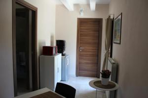 TV a/nebo společenská místnost v ubytování Archi Rooms