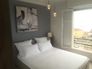Ένα ή περισσότερα κρεβάτια σε δωμάτιο στο Stella Apartment