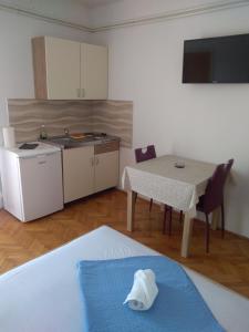 Kuchyň nebo kuchyňský kout v ubytování Apartmants Emy