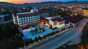 an overhead view of a building with a parking lot at Grand Terme Hotel in Kırsehir