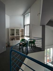 een kamer met een tafel en stoelen in een gebouw bij Superb architect villa 230m2 near beach south France in Salses-le-Chateau