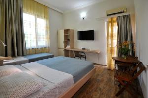 Letto o letti in una camera di Smak