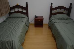 Postel nebo postele na pokoji v ubytování Hotel Obino São Borja