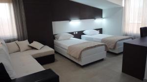 Кровать или кровати в номере Apartments Good Night