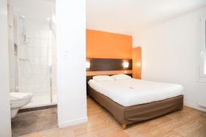 Letto o letti in una camera di Première Classe Lyon Sud - A7