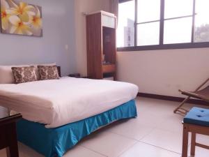 Voodi või voodid majutusasutuse Corner No.56 Guest House toas