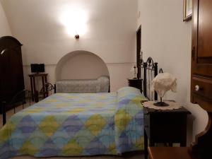 Postel nebo postele na pokoji v ubytování Masseria Cassiere