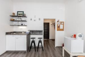 A kitchen or kitchenette at Best View Apartments