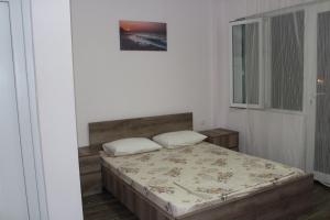 Hotel Sunrise in Ureki客房内的一张或多张床位