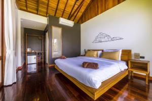 Voodi või voodid majutusasutuse Coral View Resort toas
