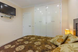 Posteľ alebo postele v izbe v ubytovaní Villa La Caleta Golf
