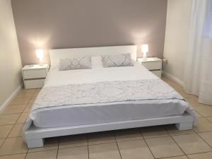 Postel nebo postele na pokoji v ubytování Sun Villa chambre chez l habitant