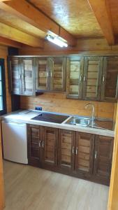 Kuchyň nebo kuchyňský kout v ubytování Resort Camping Solopuent